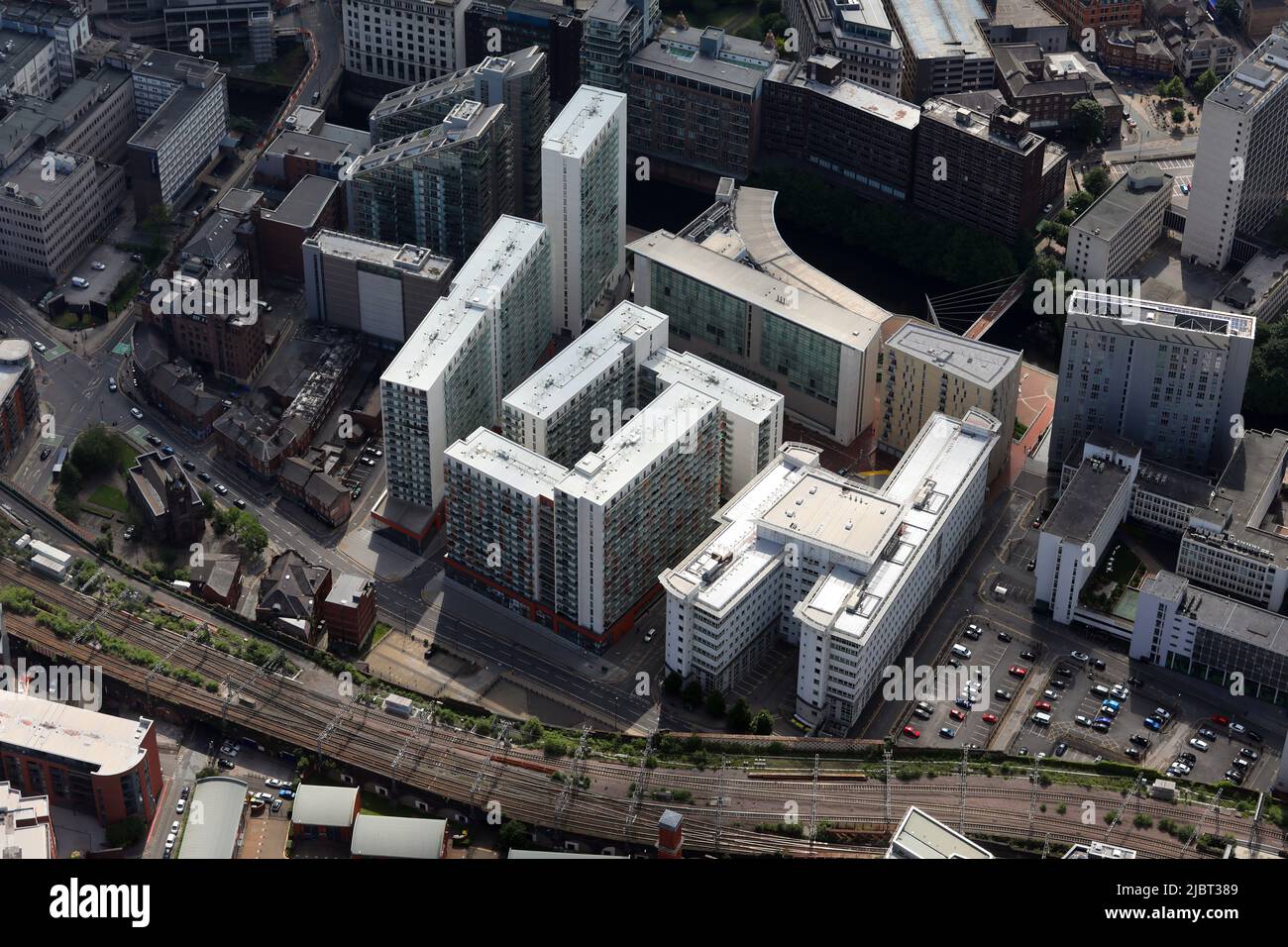 aerial view of Trinity Bridge House tax office; Alcock House, Chapman House & Bradshaw House apartment buildings, Salford, Manchester Stock Photo