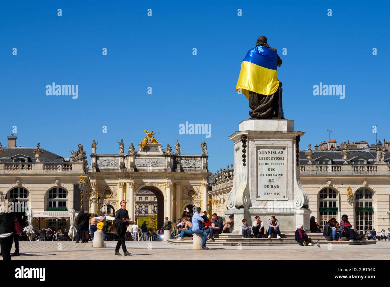 France, Meurthe and Moselle, Nancy, place Stanislas (former Place Royale) built by Stanislas Leszczynski, king of Poland and last duke of Lorraine in the eighteenth century, classified World Heritage of UNESCO, statue of Stanislas Leszczynski with Ukrainian flag Stock Photo