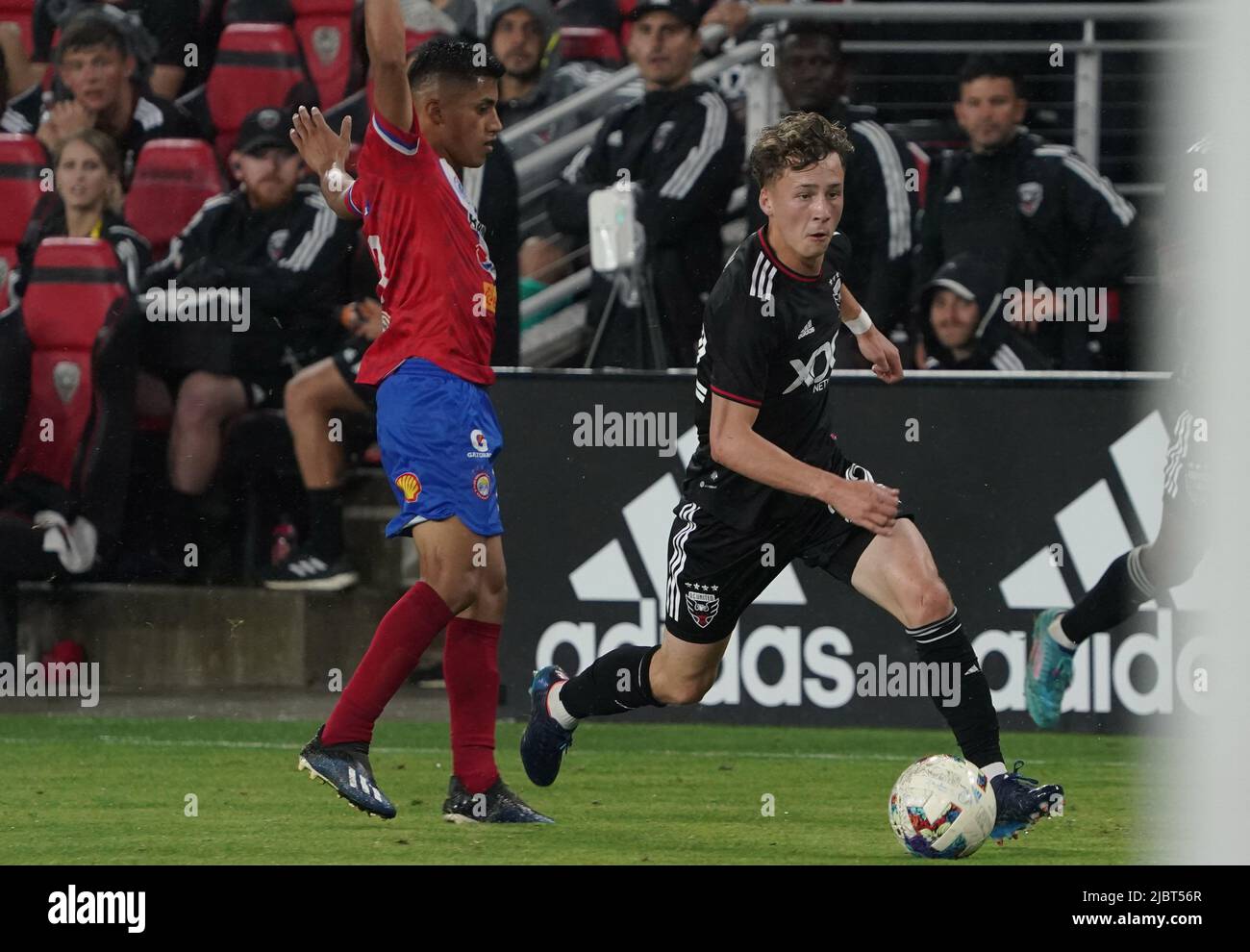 WASHINGTON, DC, USA - 07 JUNE 2022: DC United forward Griffin Yow (22) cuts away from Xelaju defender Widvin Tebalán (13) during a Capital Cup match between D.C United (USA) and Xelaju (GUA) on June 07 2022, at Audi Field, in Washington, DC. (Photo by Tony Quinn-Alamy Live News) Stock Photo