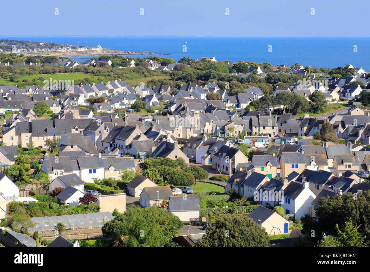France, Loire Atlantique, wild coast of the Guerande peninsula, Batz sur Mer, view from the bell tower of the Saint Guenole church over the town and the Atlantic Ocean Stock Photo