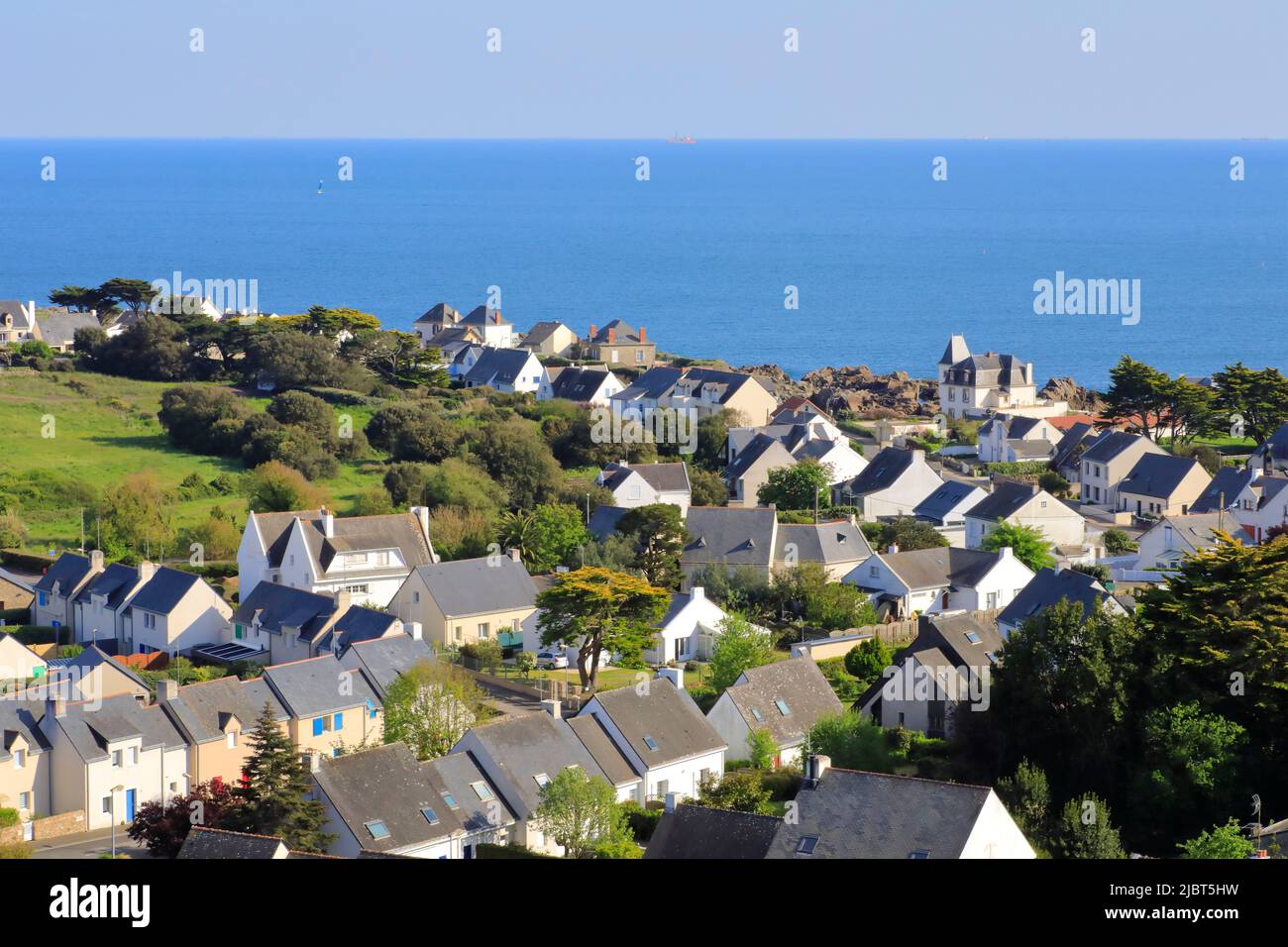 France, Loire Atlantique, wild coast of the Guerande peninsula, Batz sur Mer, view from the bell tower of the Saint Guenole church over the town and the Atlantic Ocean Stock Photo