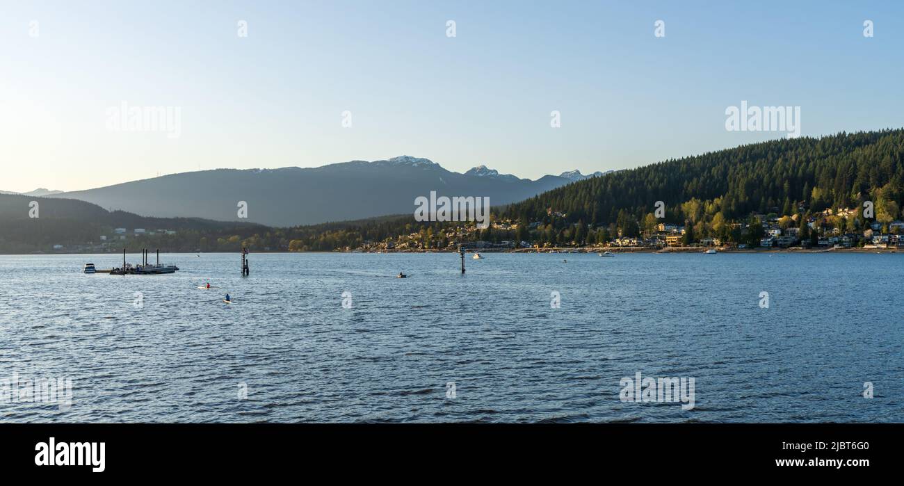 Burrard Inlet during sunset time. Rocky Point Park. Port Moody, British Columbia, Canada. Stock Photo