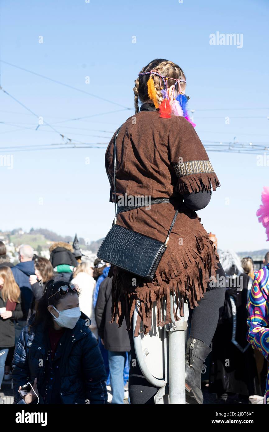 Spectator at the carnival parade in the city of Lucerne, Switzerlandd Stock Photo