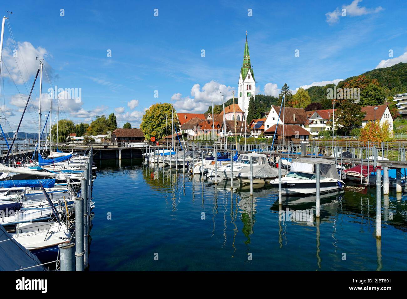 Germany, Baden Wurttemberg, Lake Constance (Bodensee), Sipplingen, lakeside with parish church of St. Martin and the port Stock Photo