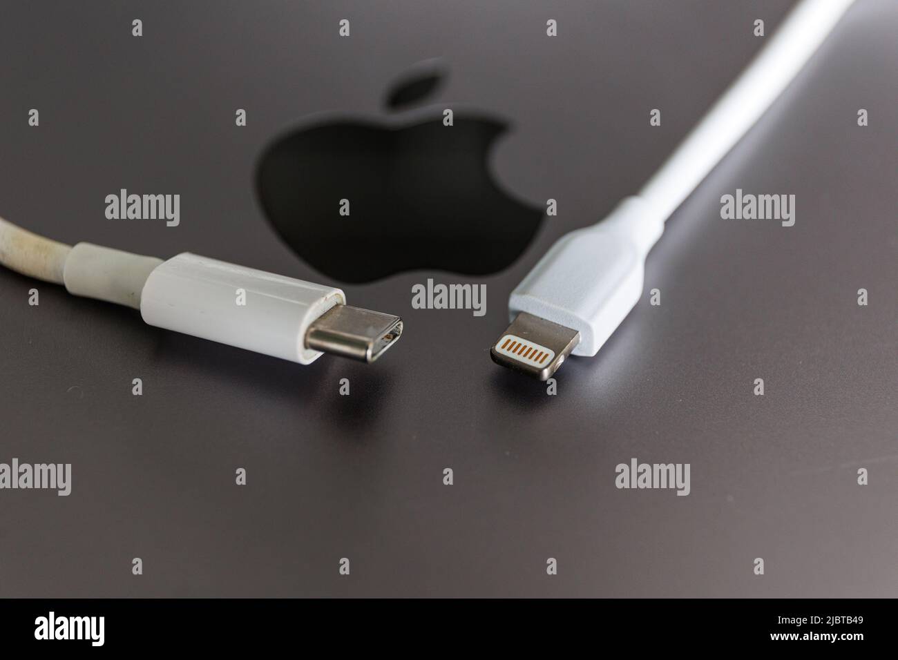 Apple charger and USB Type C charger Stock Photo - Alamy