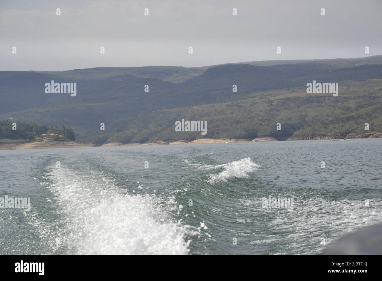 Tourists having fun on a speedboat ride inside the canyons, with several boats anchored, Brazil, South America, panoramic photo, view behind Stock Photo