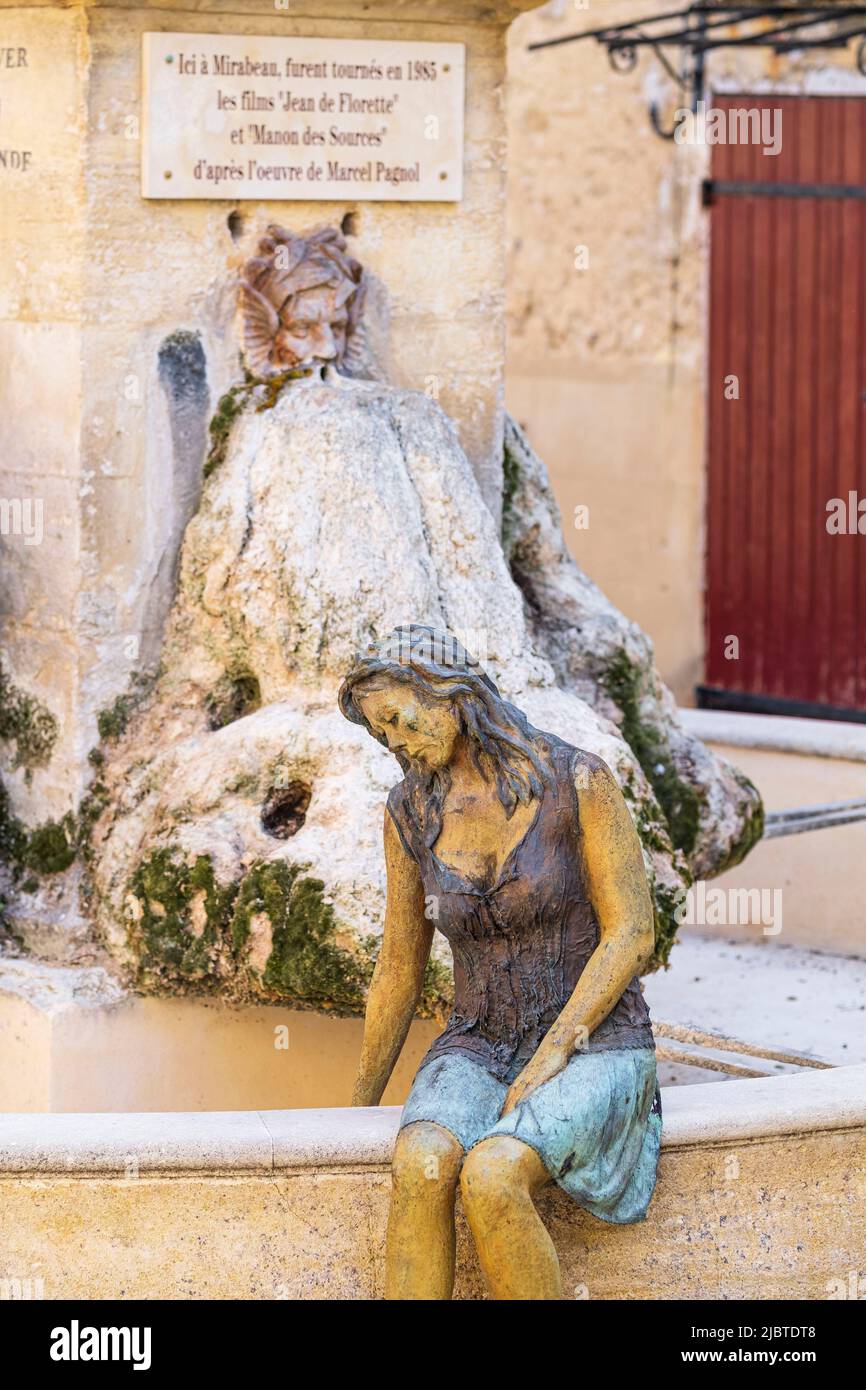 France, Vaucluse, Luberon Regional Natural Park, Mirabeau, fountain and Manon bronze statue by the artist Jean-Jacques Mancardi, character from the film Manon des Sources shot in the village by Claude Berri based on the work of Marcel Pagnol Stock Photo