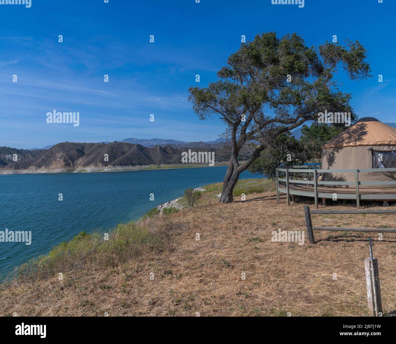 A yurt overlooks Lake Cachuma in Santa Barbara county, CA. Stock Photo