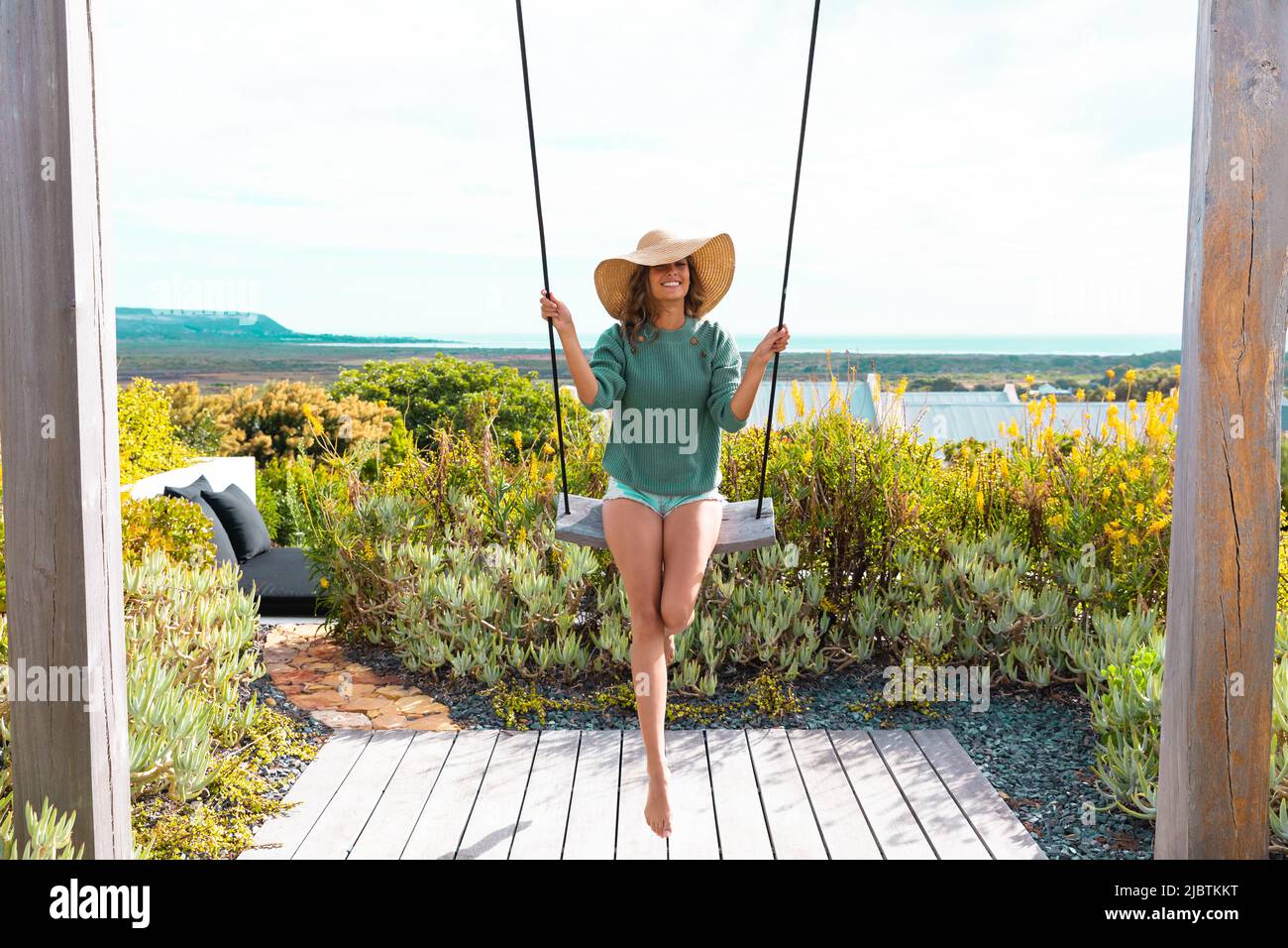 Beautiful woman on swing hi-res stock photography and images - Alamy