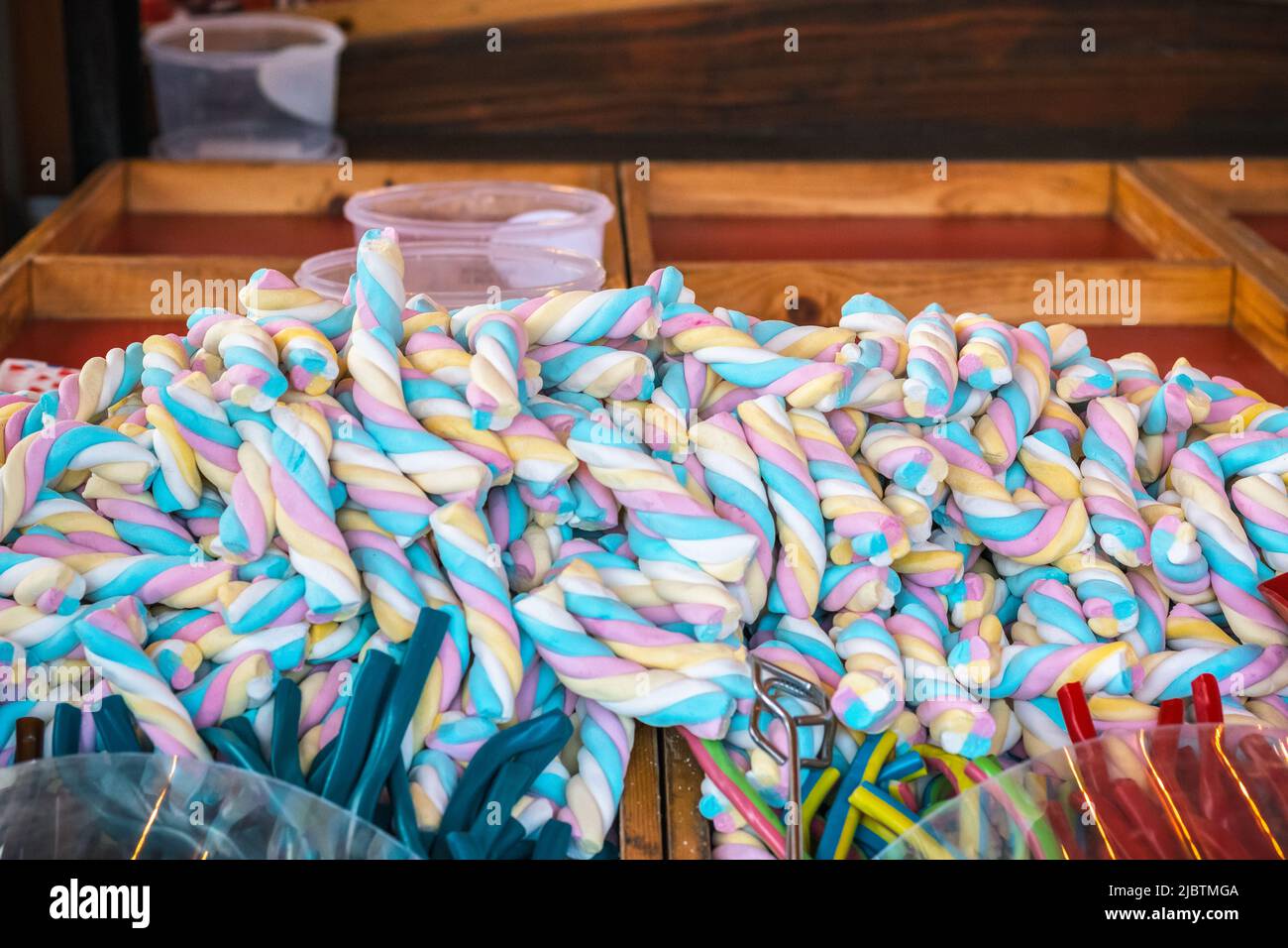 Big marshmallow twists on display at Christmas market Hyde Park Winter Wonderland in London Stock Photo