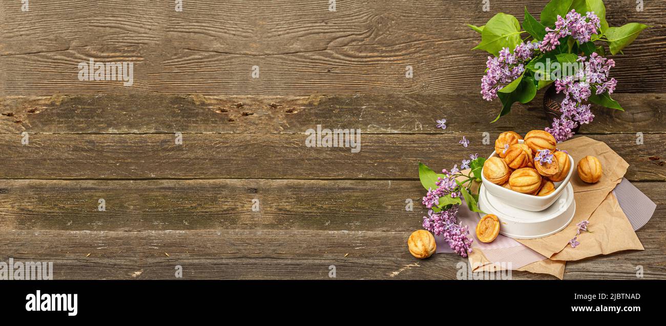 Cookies in the shape of walnuts with condensed milk cream filling