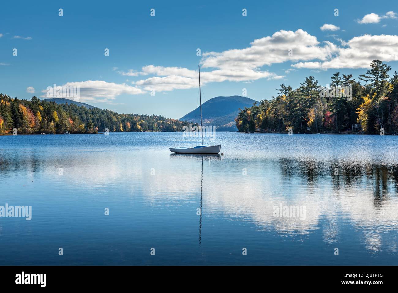 Small sailboat on the Long Pond in the Acadia National Park, Maine. Concept of tranquility and travel Stock Photo