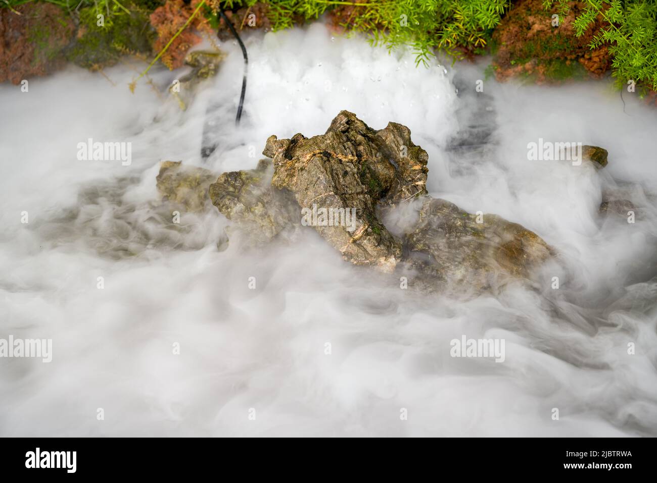 Stream in garden rockery hi-res stock photography and images - Alamy