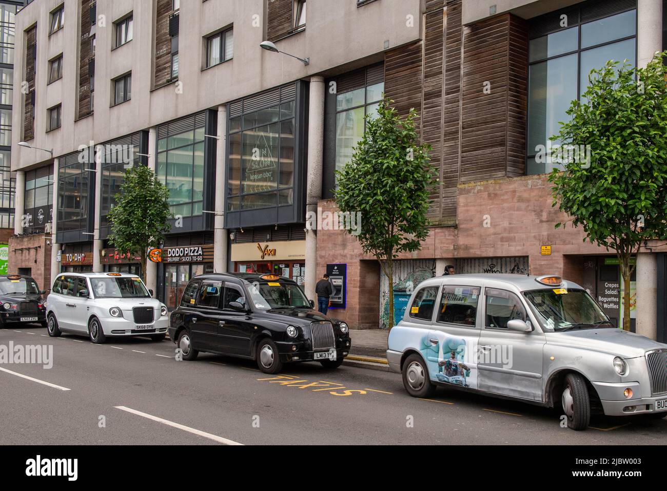 Line of taxis in Hales Street, Coventry, West Midlands, UK. Stock Photo