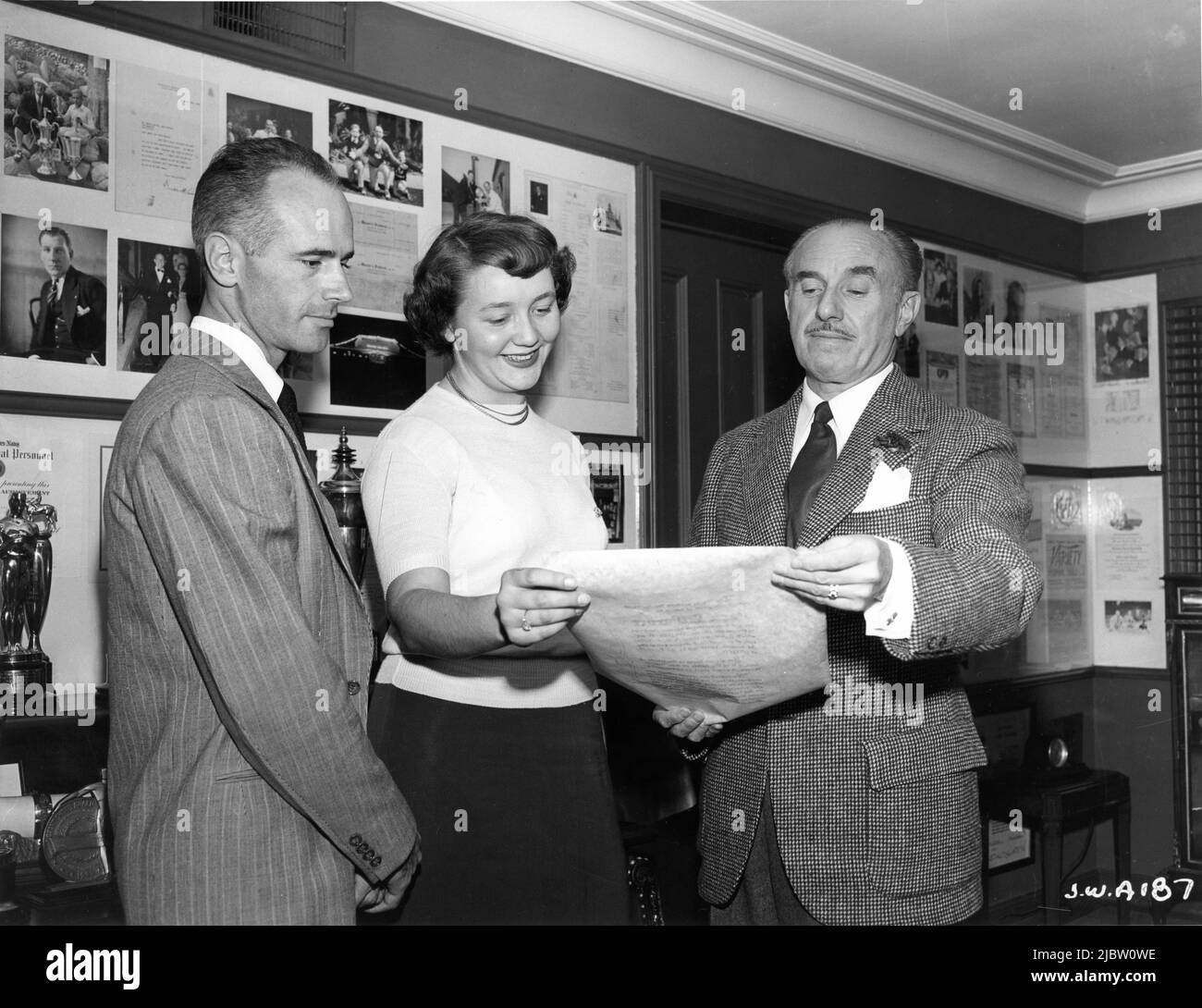 Executive Producer JACK L. WARNER receiving an Award Scroll circa 1949