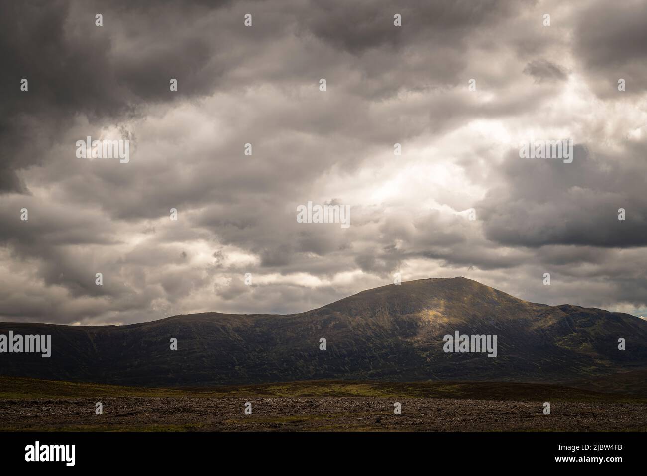 A cloudy summer HDR image of appraoching bad weather over Mackay Country, Sutherland, Scotland. 31 May 2022 Stock Photo