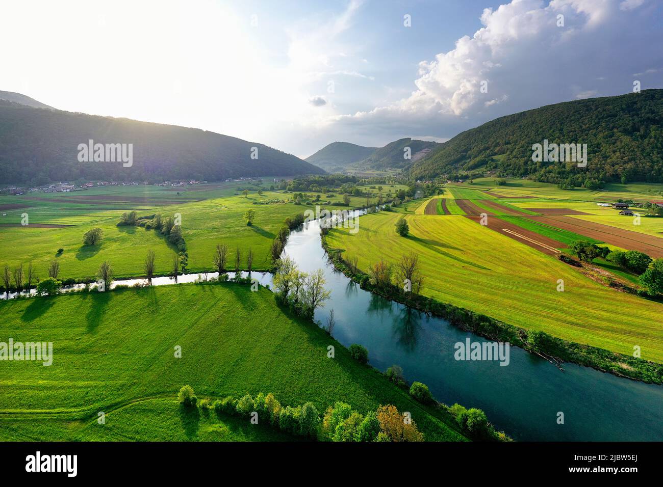 Aerial view of a beautiful Krka river at the end of a beautiful summer day near Dolenjske toplice, Slovenia Stock Photo