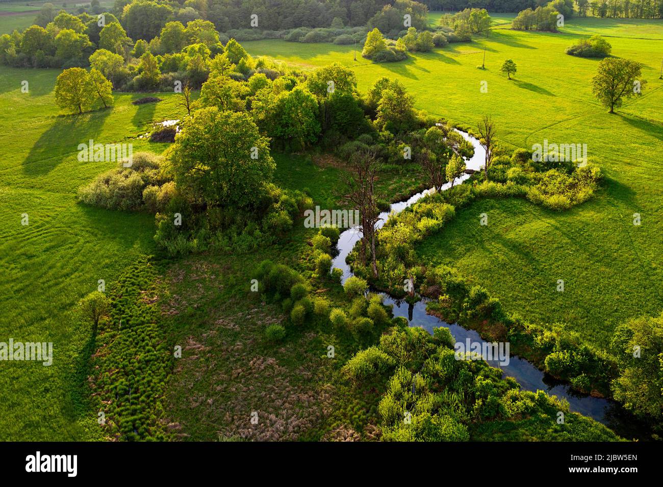 Aerial view of a beautiful small creek that flows in Krka river near Dolenjske toplice in Slovenia Stock Photo