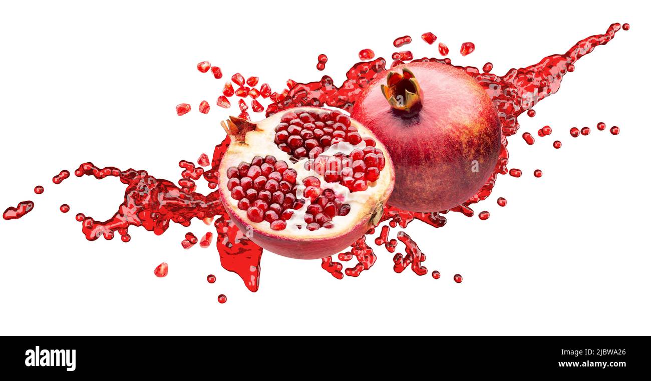 pomegranates in red juice splash with isolated on a white background with clipping path. Stock Photo