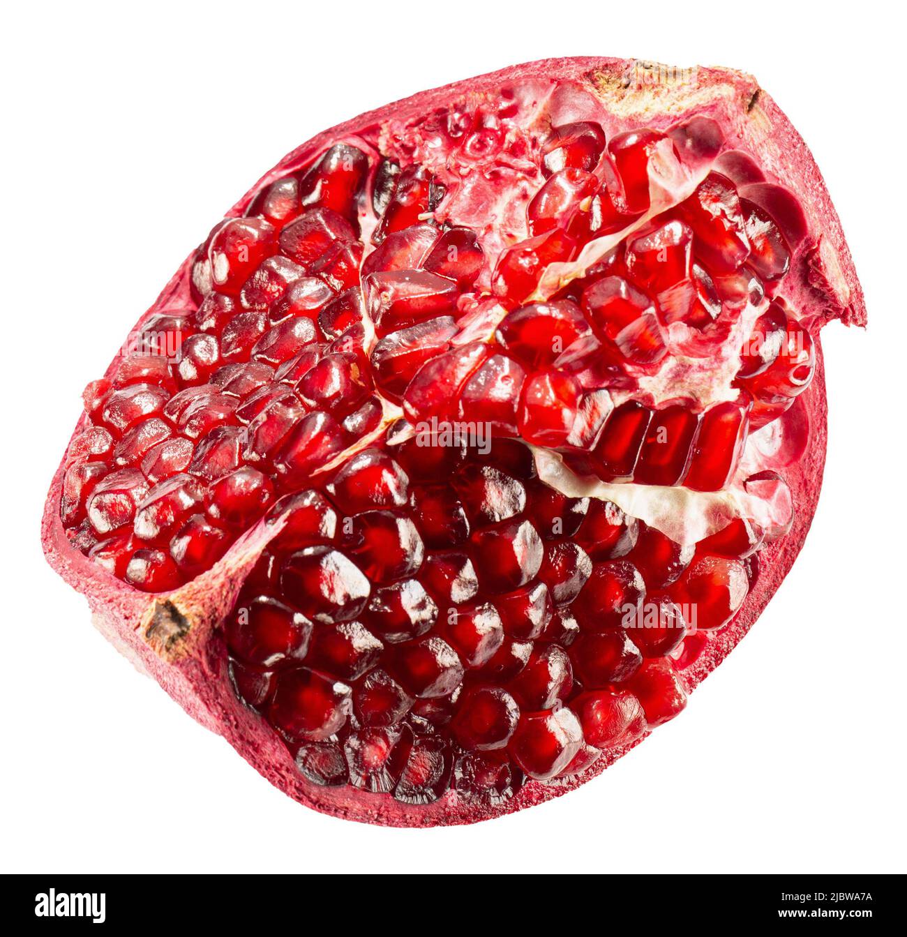pomegranate slice with red seeds isolated on a white background with clipping path. Stock Photo