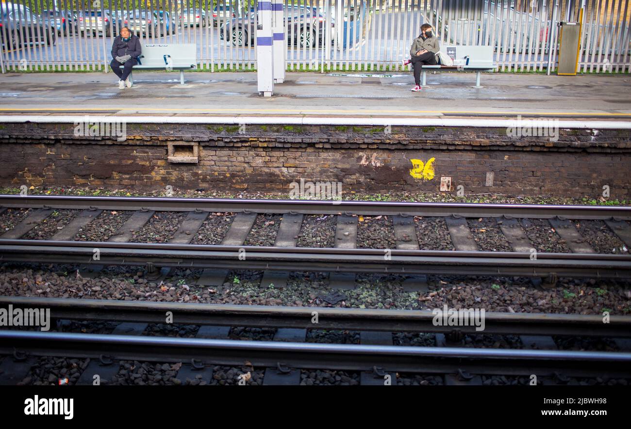 Passengers and trains at the platforms at Chatham railway station