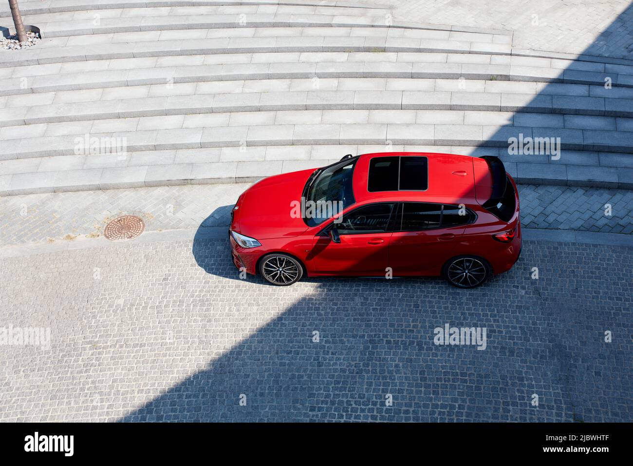 Red BMW M135i Top view. Model F40, produced from 2019. 306 HP engine, acceleration 0-100 km-h - 4.8 s Katowice, Poland- 09.16.2020 Stock Photo