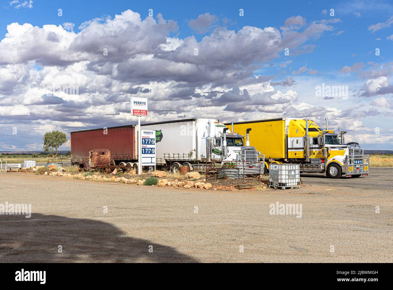 Road trains outside the Little Topar Roadhouse on the Barrier Highway in Outback New South Wales Stock Photo