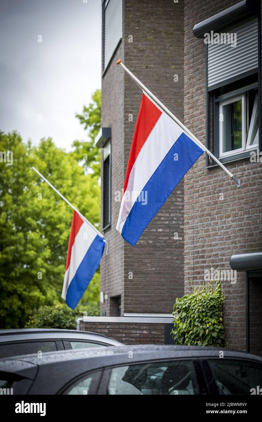 2022-06-08 18:19:22 KERKRADE - Flags are flown at half mast prior to a silent march in memory of 9-year-old Gino. The boy disappeared from a playground on June 1, and his remains were found a few days later near a house. A 22-year-old suspect has been arrested. ANP MARCEL VAN HOORN netherlands out - belgium out Stock Photo