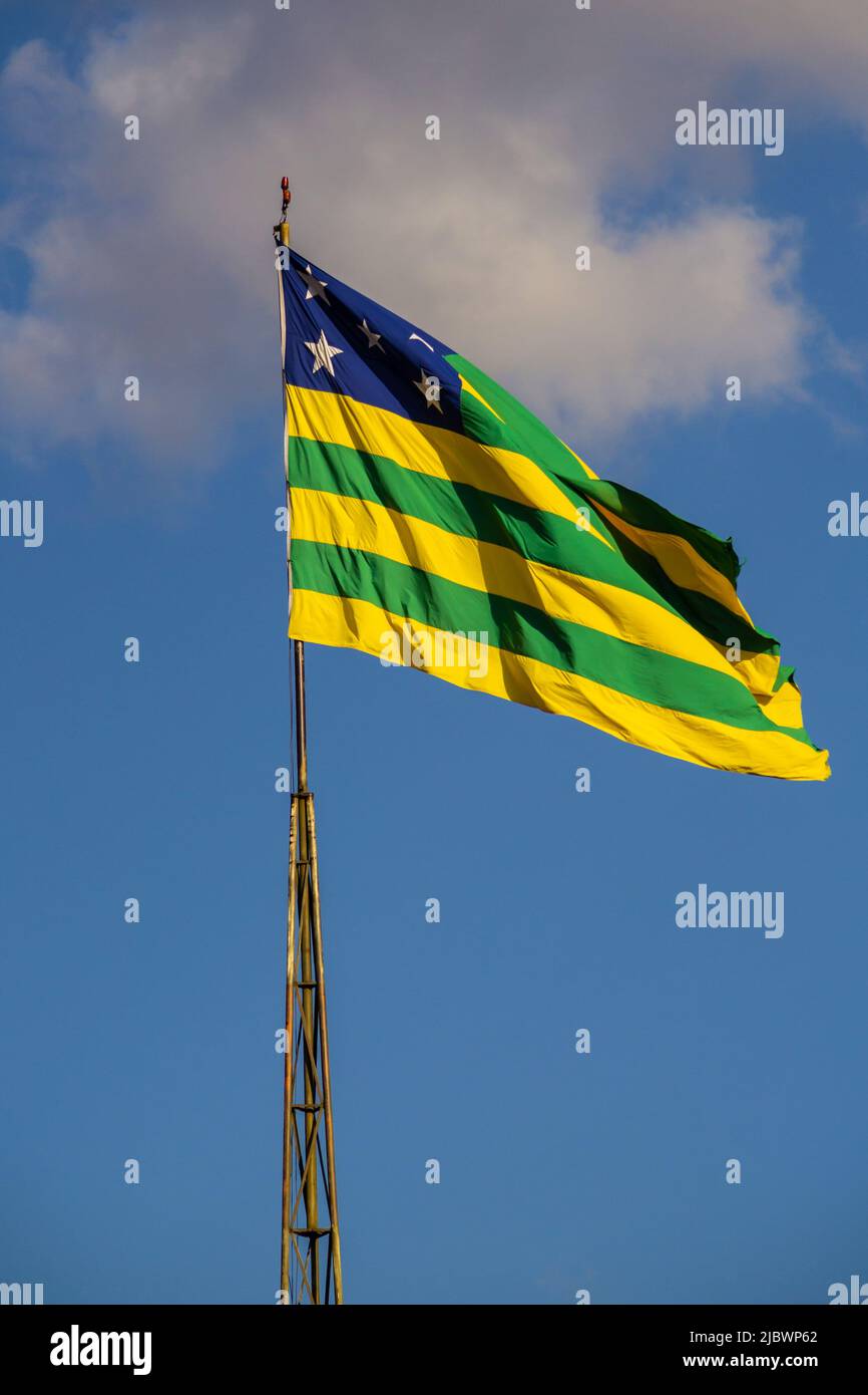 Goiânia, Goiás, Brazil – June 05, 2022:  Goiás state flag waving in the wind with sky in the background. Stock Photo