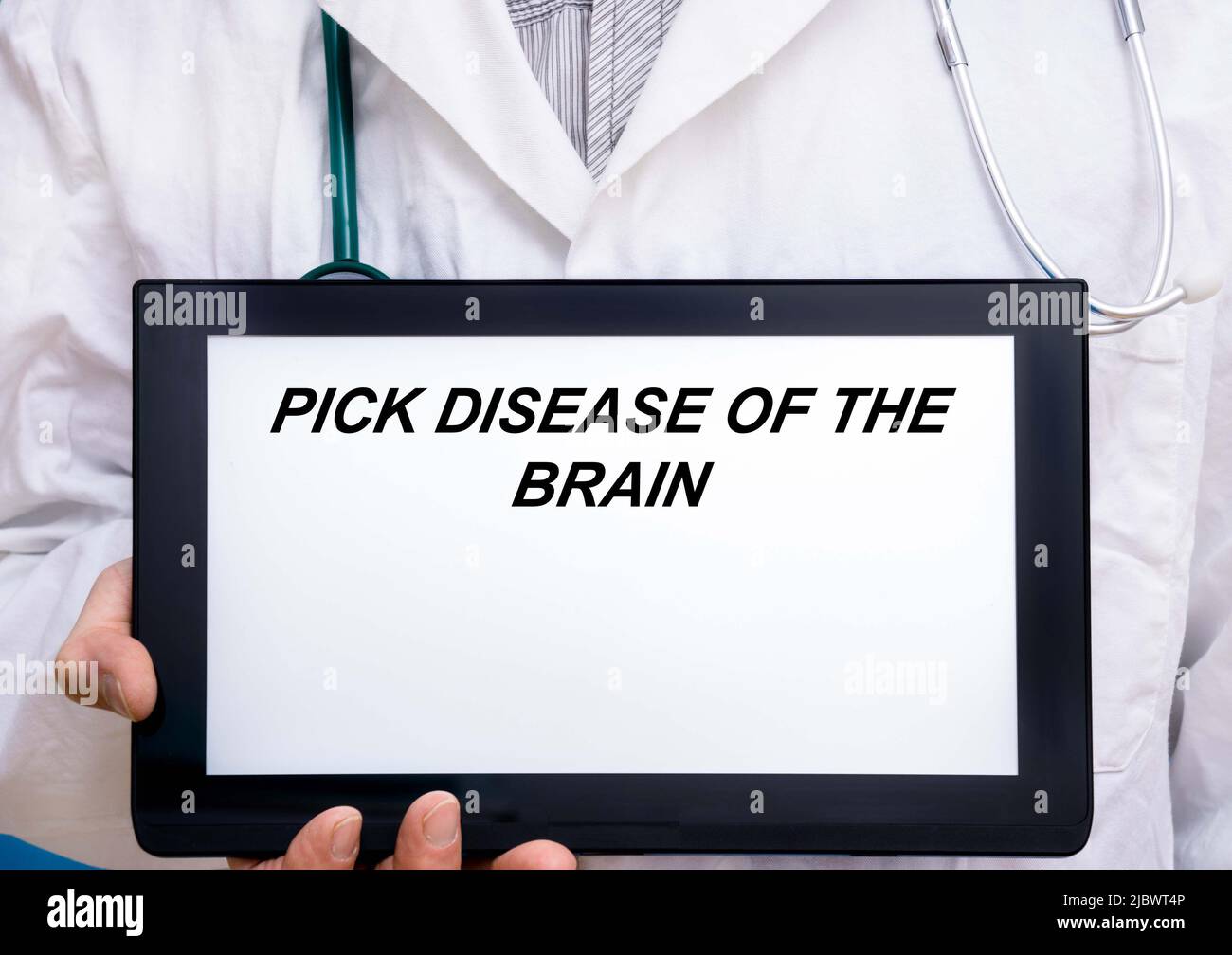 Pick Disease Of The Brain. Doctor with rare or orphan disease text on tablet screen Pick Disease