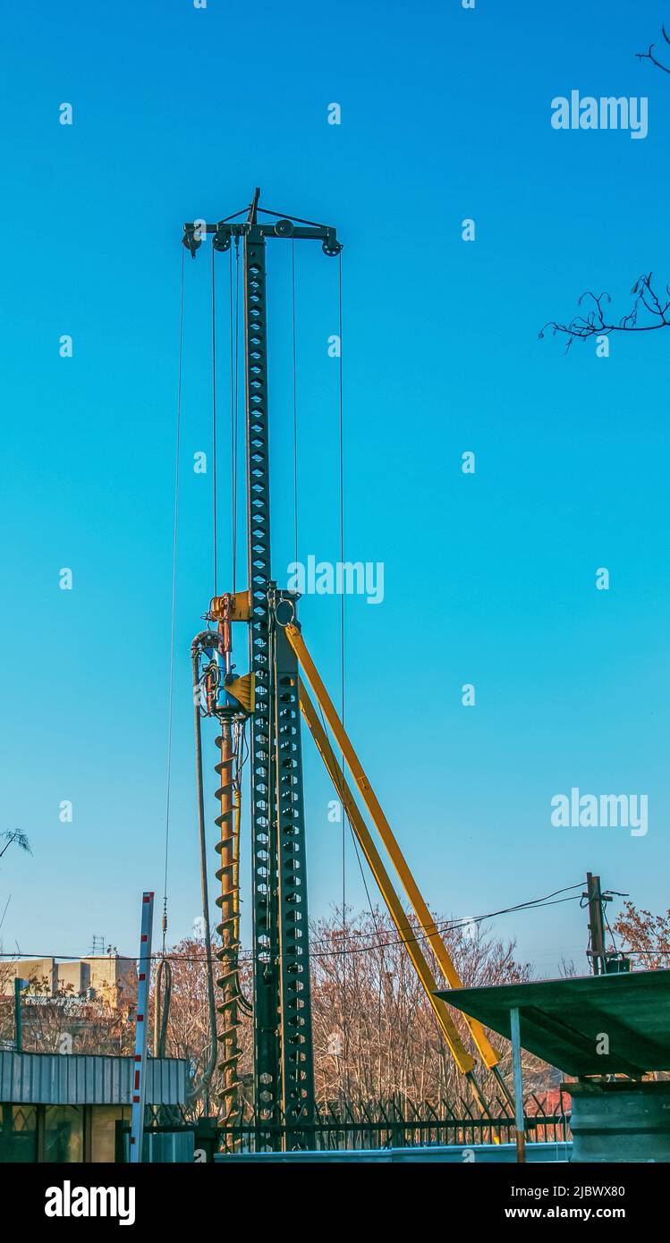 Hydraulic drilling rig. Installation of bored piles with a casing