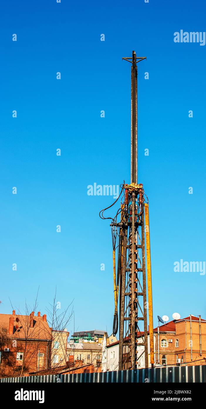 Hydraulic drilling rig. Installation of bored piles with a casing ...