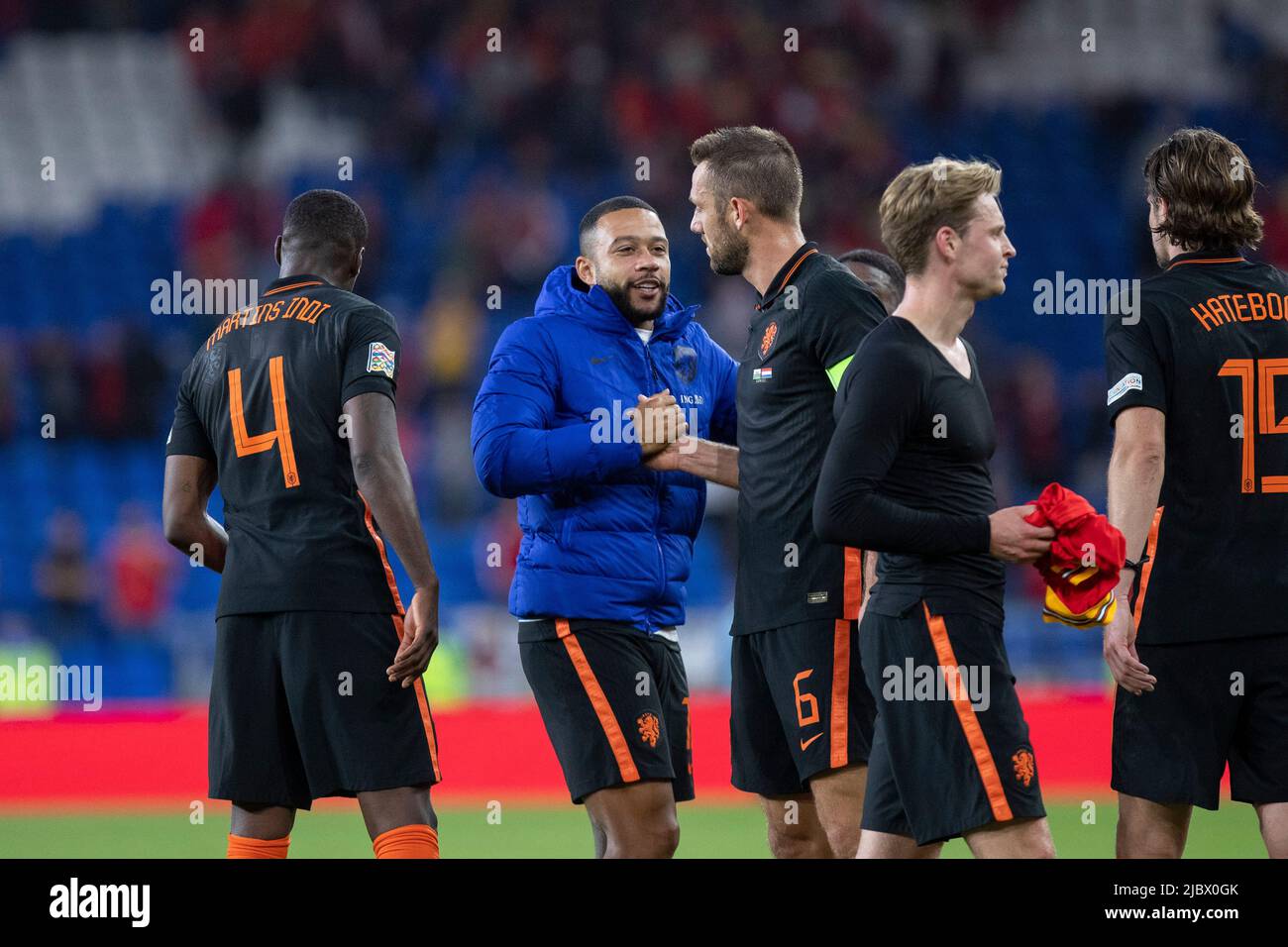 Cardiff, Wales, UK. 8th June, 2022. Memphis Depay of Netherlands celebrates with Stefan de Vrij of Netherlands after the UEFA Nations League match between Wales and Netherlands at the Cardiff City Stadium. Credit: Mark Hawkins/Alamy Live News Stock Photo