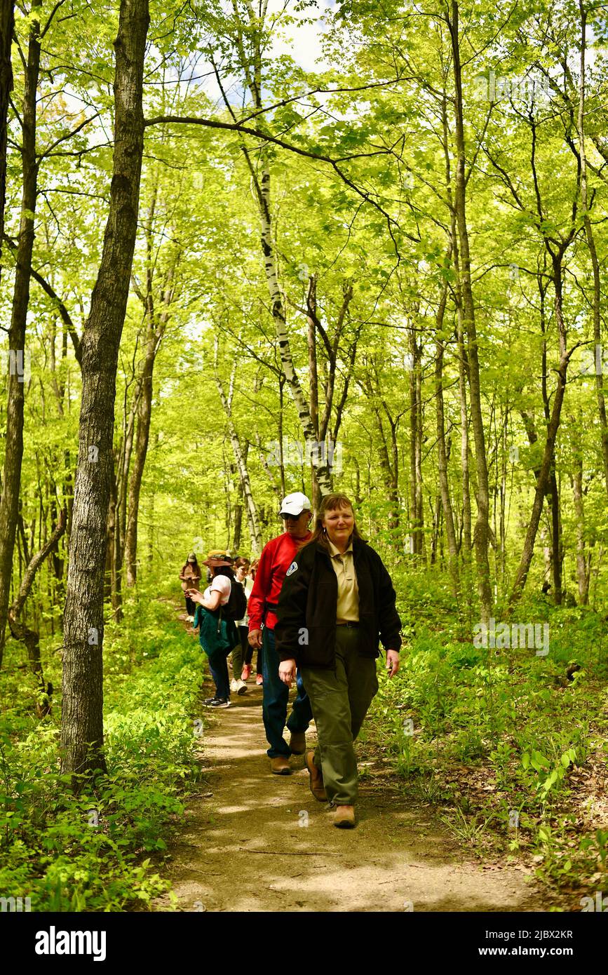 Group of hikers on Ice Age National Scenic Trail, led by a guide with the Wisconsin Department of Natural Resources, Elkhart Lake, Wisconsin, USA Stock Photo