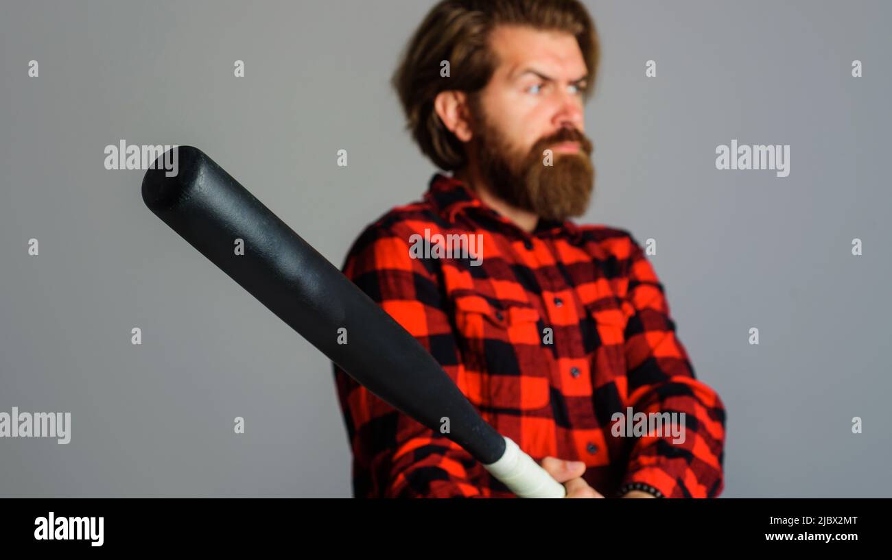 Sport equipment. Bearded man with baseball bat. Professional baseball player. Selective focus. Stock Photo