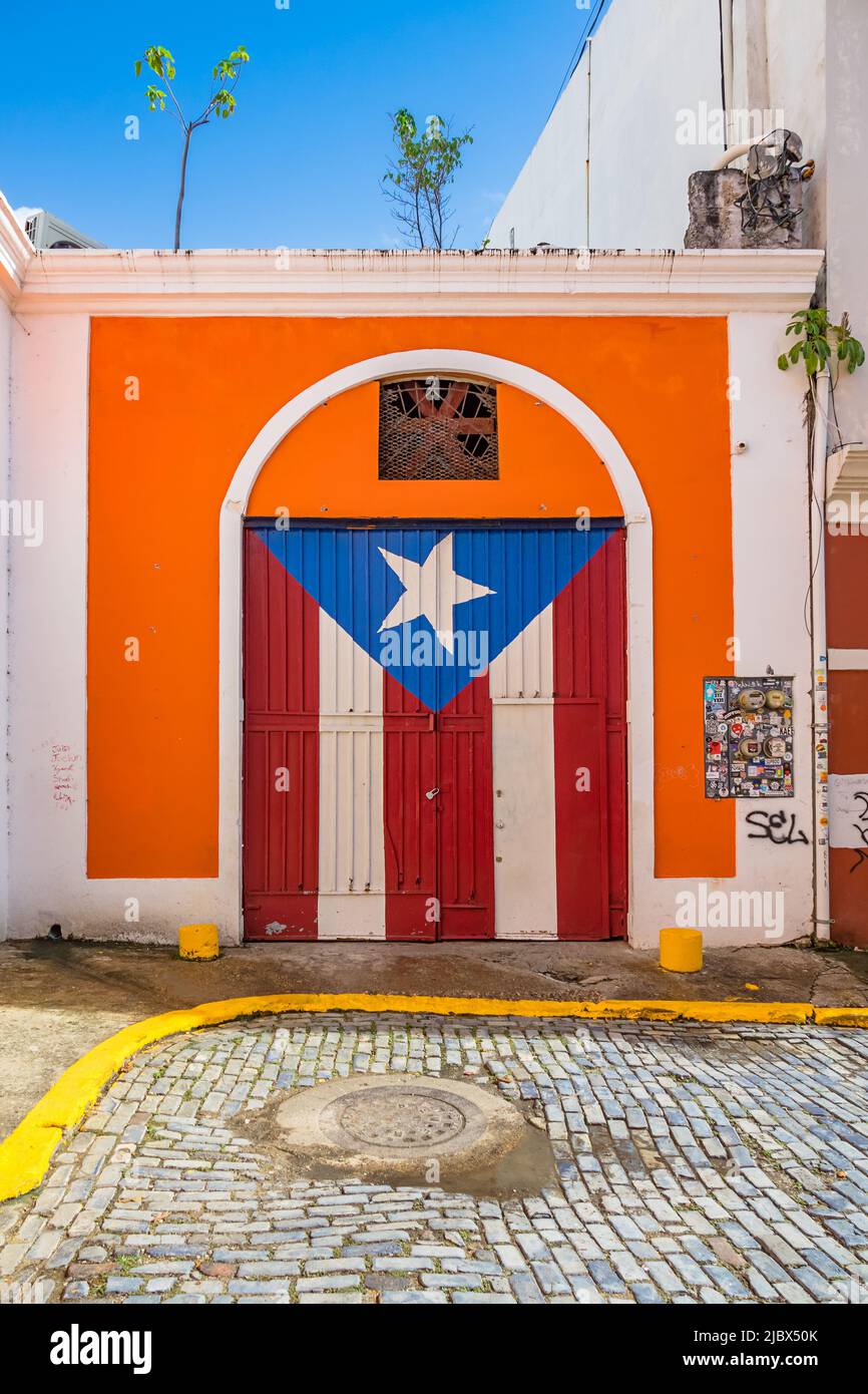 Gate with Puerto Rican Flag in Old San Juan, Puerto Rico on a sunny day. Stock Photo