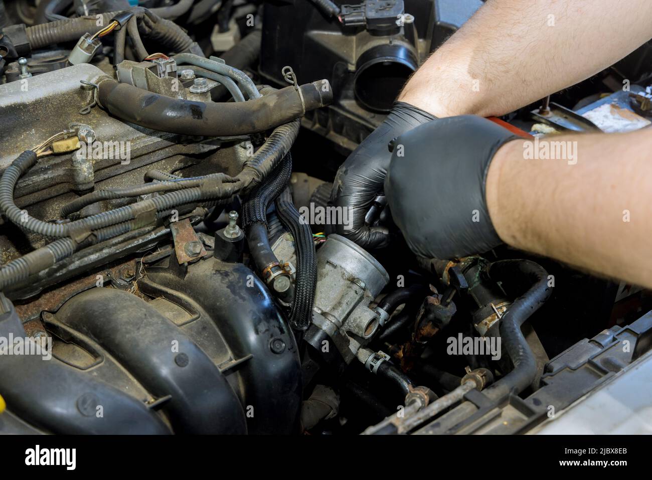 Throttle pipe with throttle position sensor and mass air flow sensor Stock Photo Alamy
