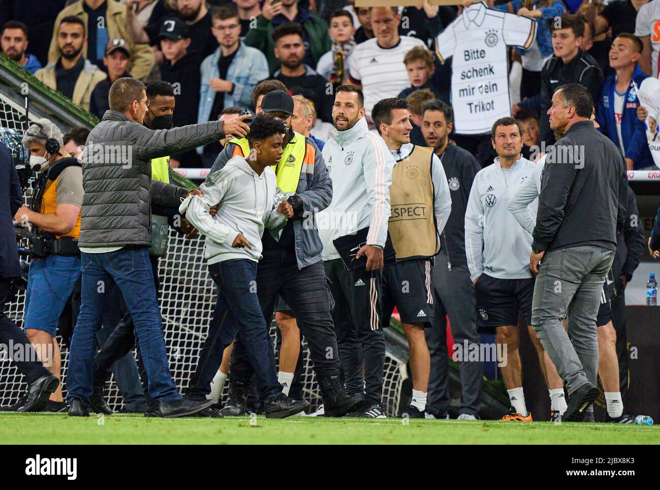 Security a streaker, flitzer, speedster, after the UEFA Nations League ...