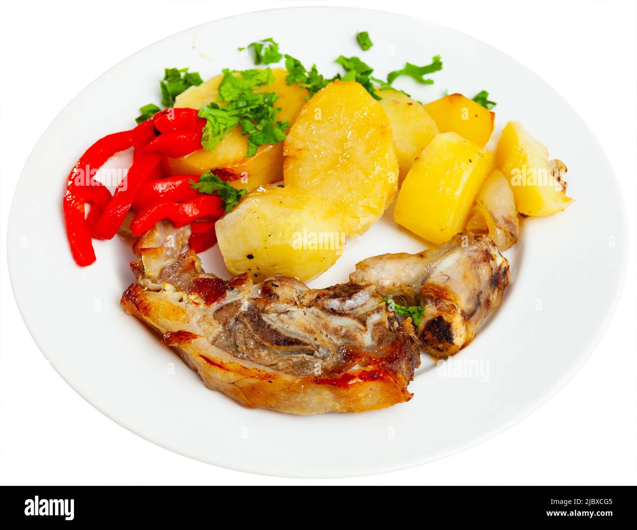 Side dish of baked lamb leg with potatoes and pepper Stock Photo - Alamy