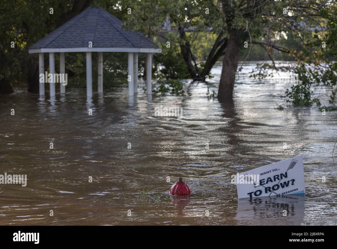 BRIDGEPORT, PA – September 2, 2021: Floodwaters from the overflowing Schuylkill River are seen as remnants of Hurricane Ida impacted the Mid-Atlantic. Stock Photo