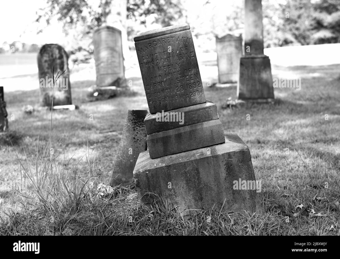 The broken gravestone. Stock Photo