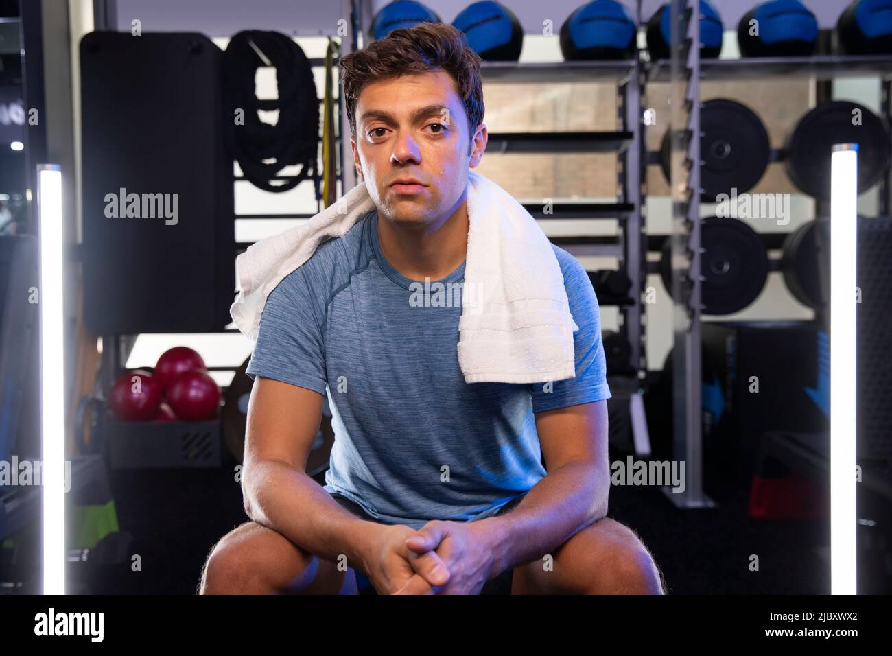 Portrait of man taking a break during workout looking into cameras Stock Photo