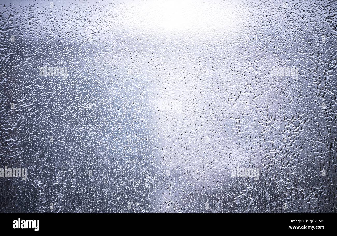 Ice frozen on a window during a snow storm in Dallas, Texas. Stock Photo