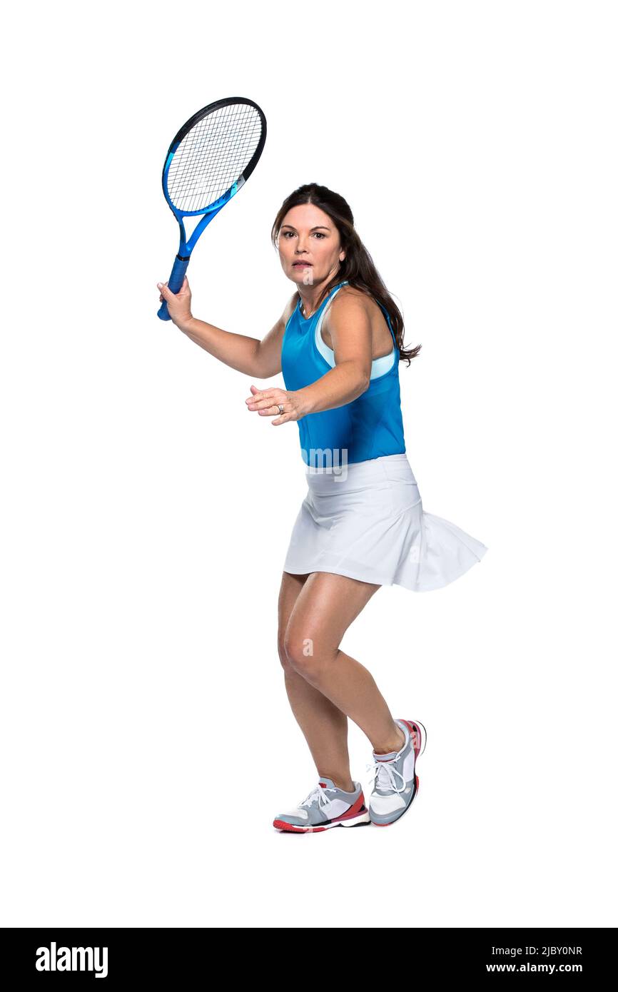 Female Tennis player playing on white background Stock Photo