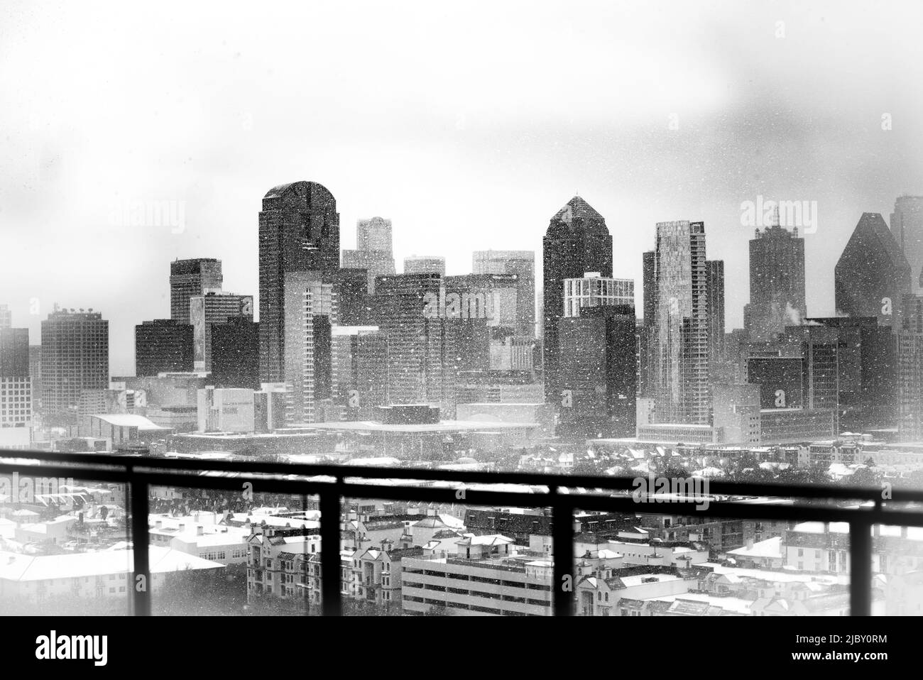 A Black and White Image of The Dallas Skyline During a Snow Storm Stock Photo