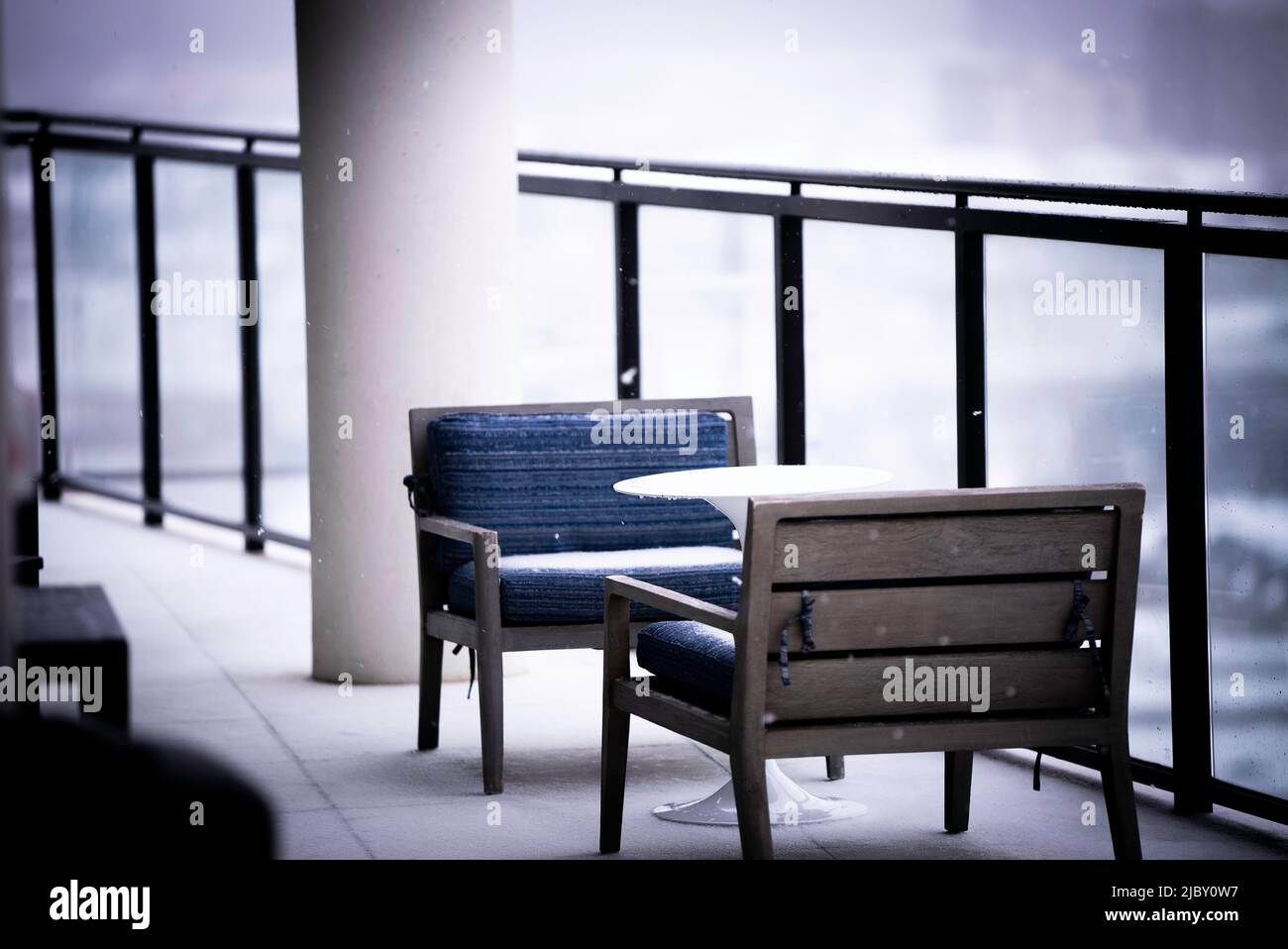 Two chairs on balcony hi-res stock photography and images - Alamy