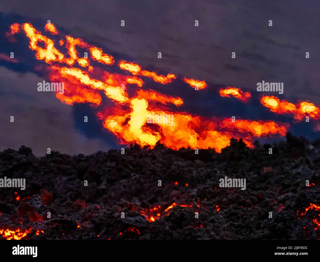 Glowing river of lava from Fagradalsfjall volcanic eruption at Geldingadalir, Iceland Stock Photo