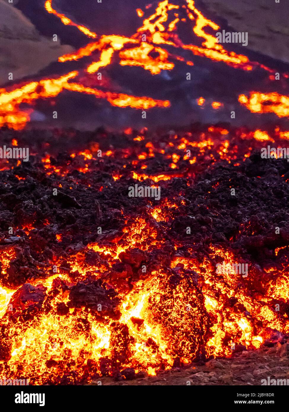 Glowing river of lava from Fagradalsfjall volcanic eruption at Geldingadalir, Iceland Stock Photo