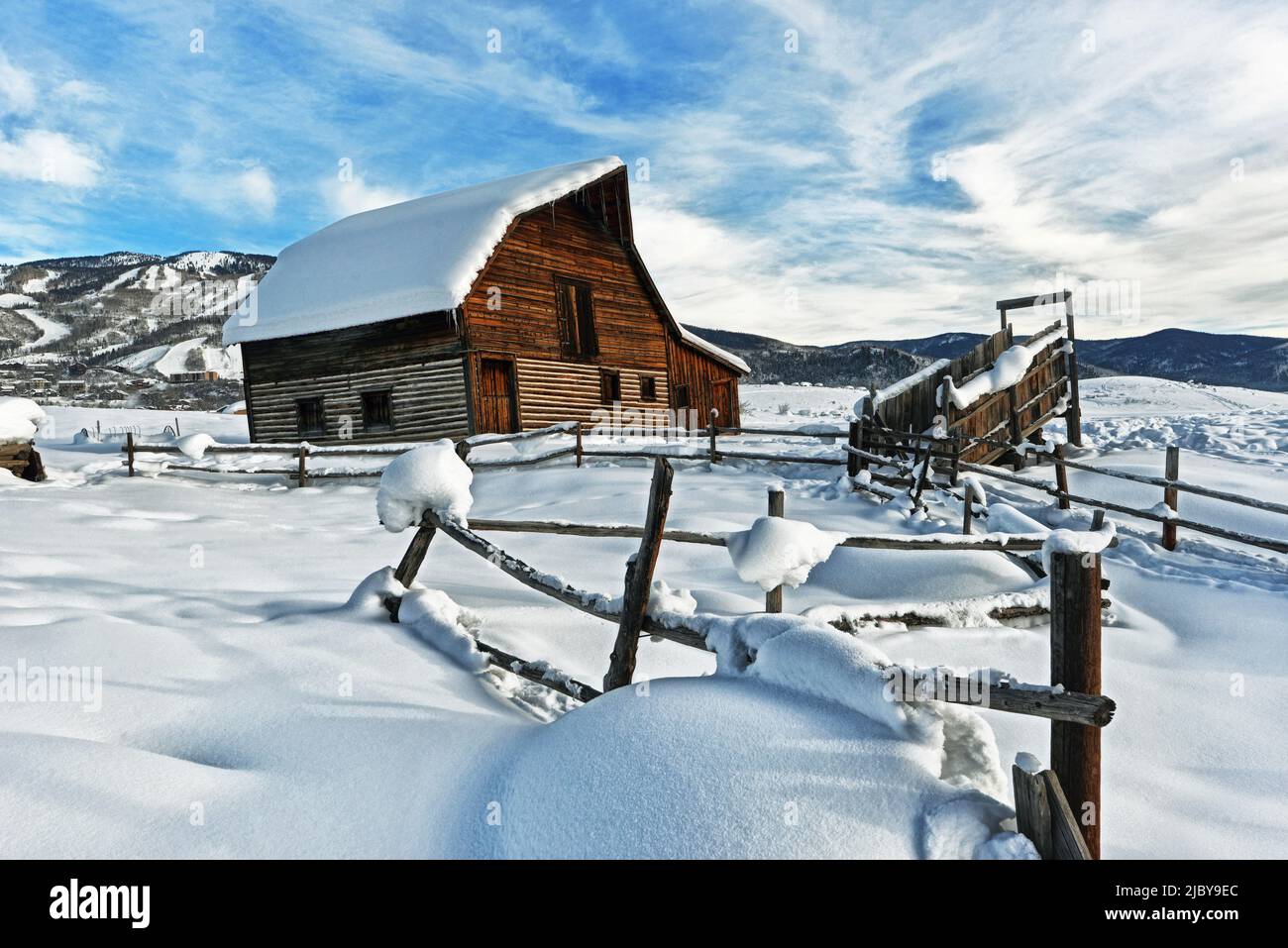 Steamboat Springs Colorado old wooden barn on snowy morning Stock Photo