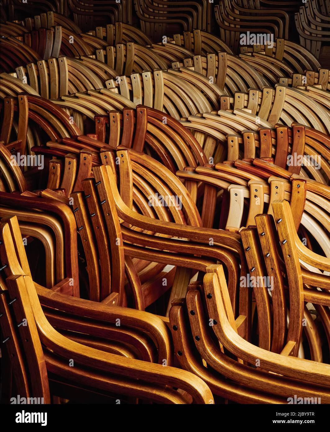 Wooden chair frames stacked together Stock Photo Alamy